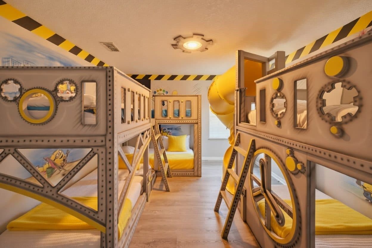 Industrial themed bunk room with built-in tube slide and ladder at an Orlando vacation rental