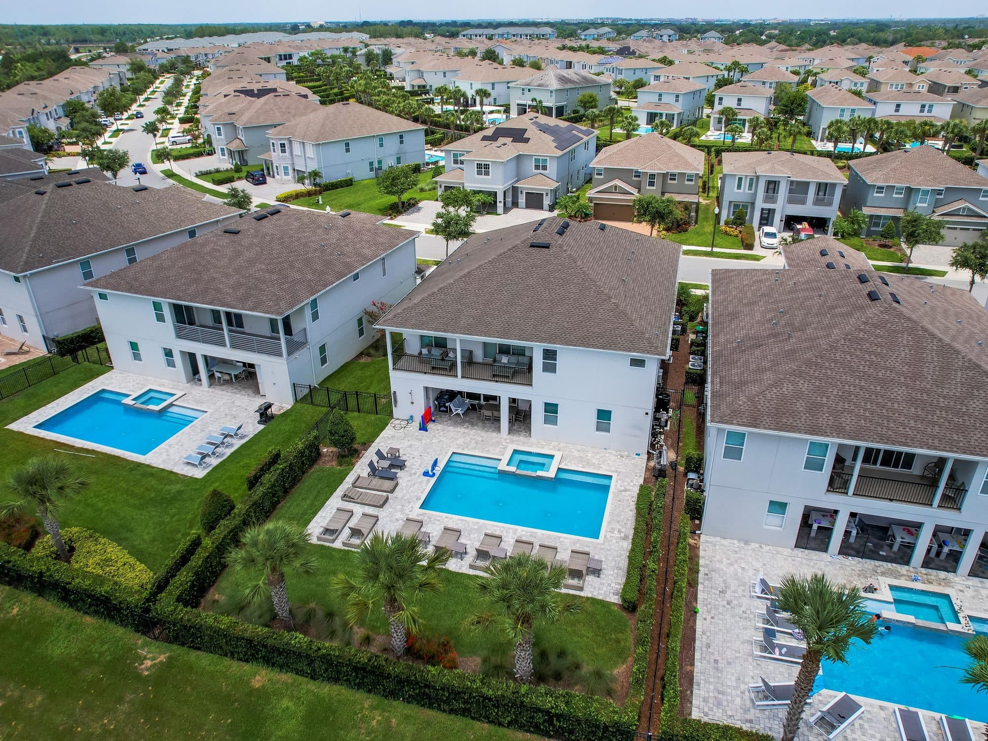 Drone aerial photograph of a resort vacation home community near Orlando with private pools