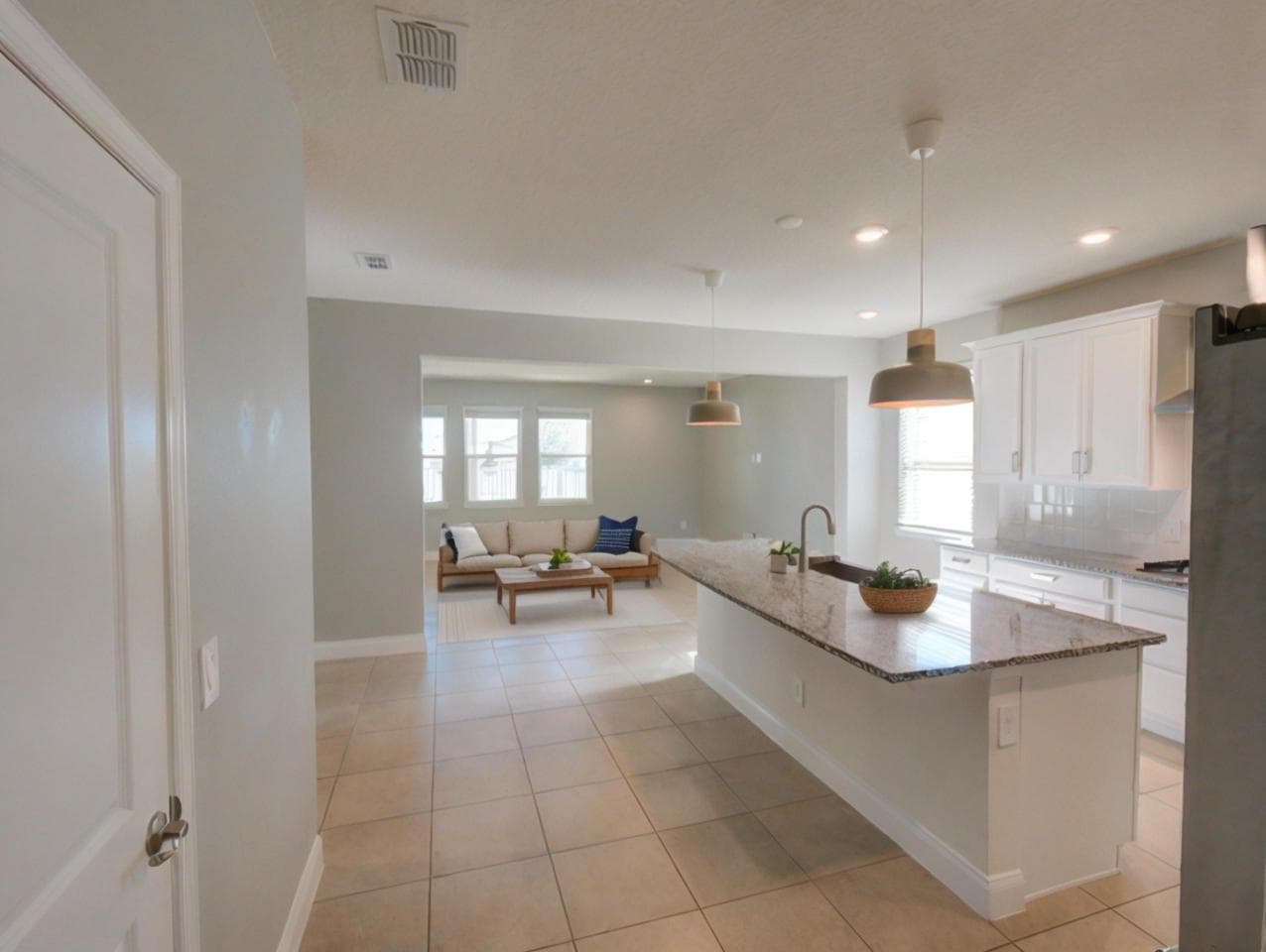 AI staged kitchen to living Orlando